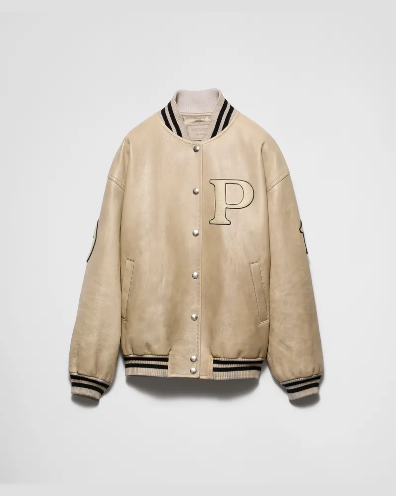 Prada Bomberjacke aus Leder mit Aufnähern Elfenbein