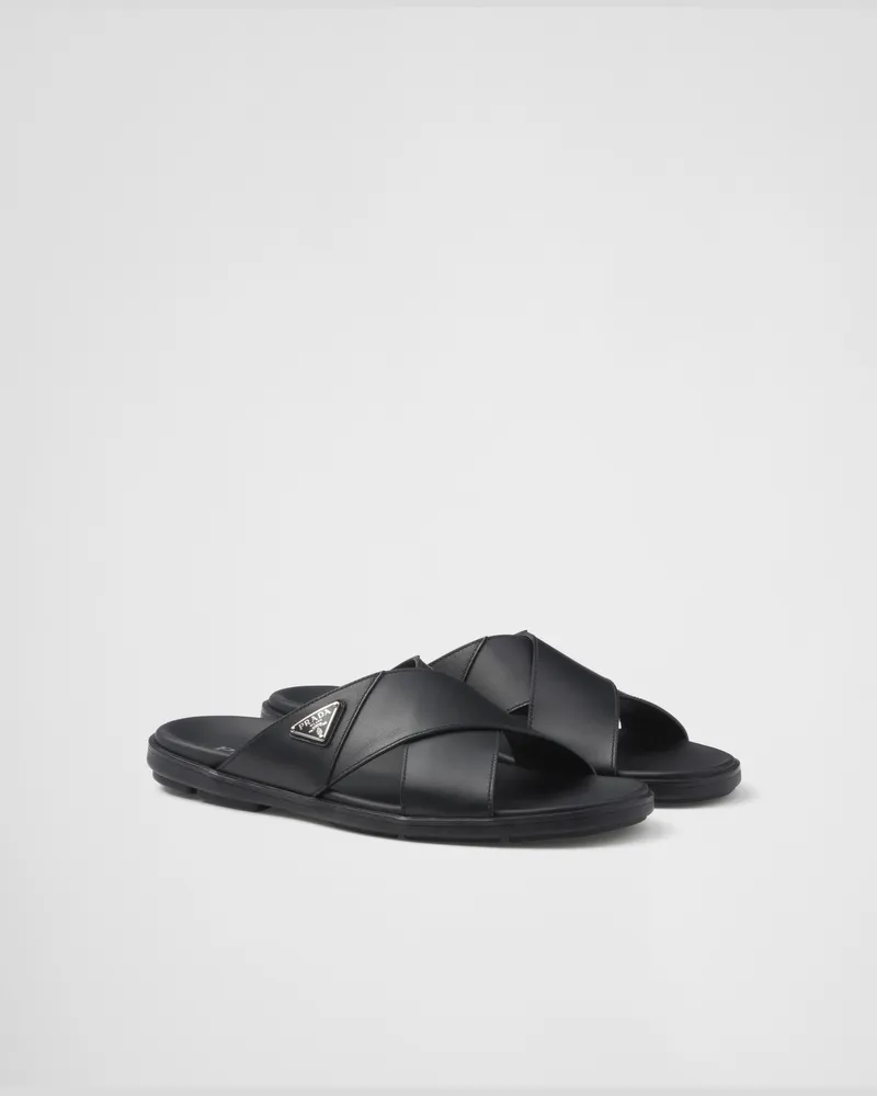 Prada Pantoletten aus Leder mit gekreuztem Band Schwarz