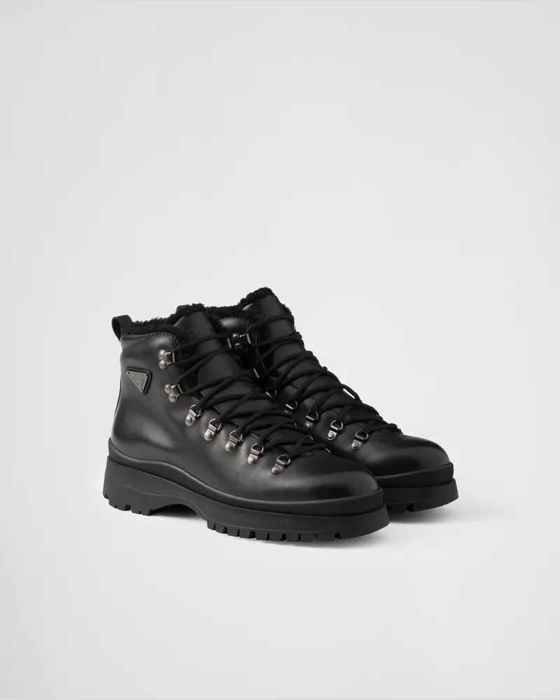 Prada Brixxen Stiefeletten aus Leder Schwarz