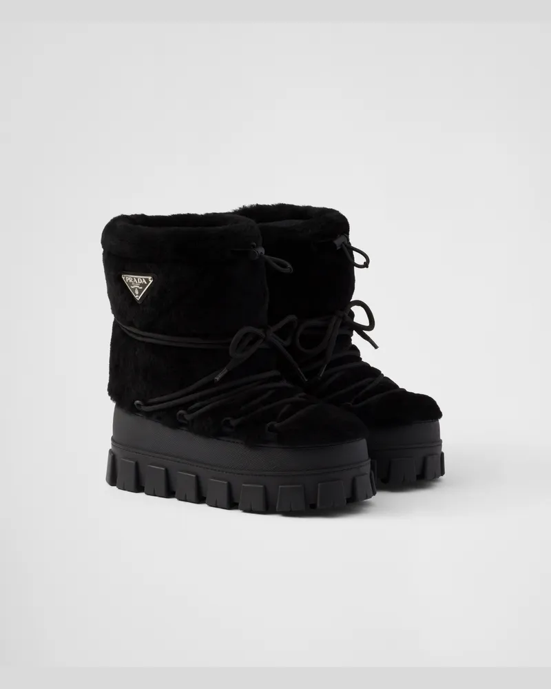 Prada Après-Ski-Stiefeletten aus Lammfell Schwarz