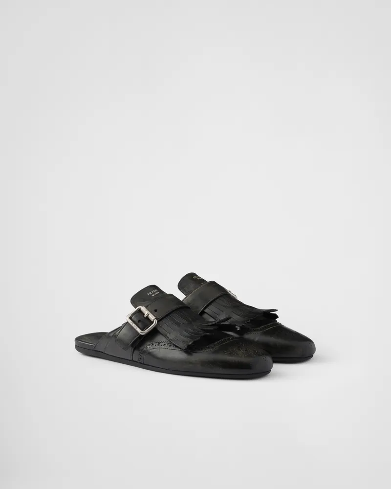 Prada Shuffle Mules aus Leder mit Fransen Schwarz