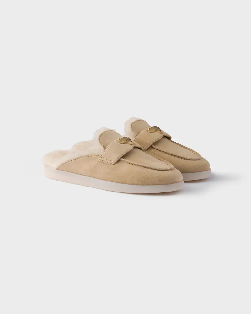 Prada Mules aus Wildleder und Lammfell Ecru