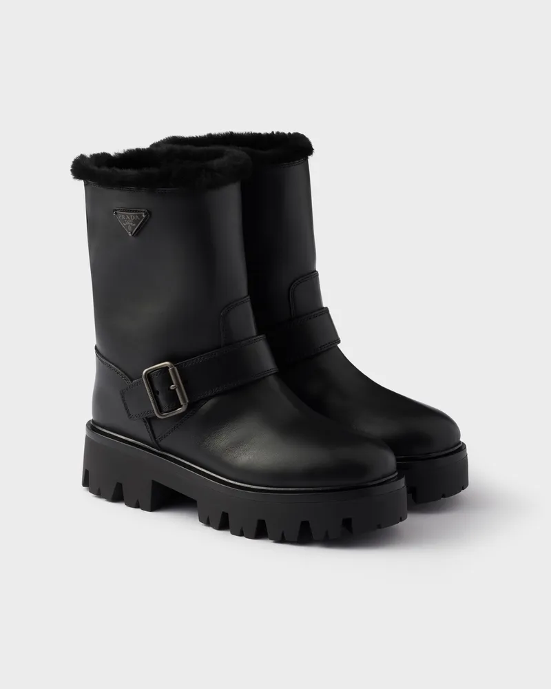 Prada Stiefeletten aus Leder und Lammfell Schwarz
