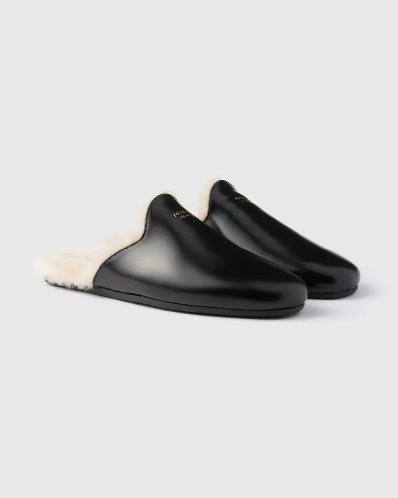 Prada Mules aus gebürstetem Leder und Lammfell Schwarz