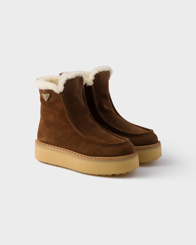 Prada Stiefeletten aus Wildleder und Lammfell Kakaobraun