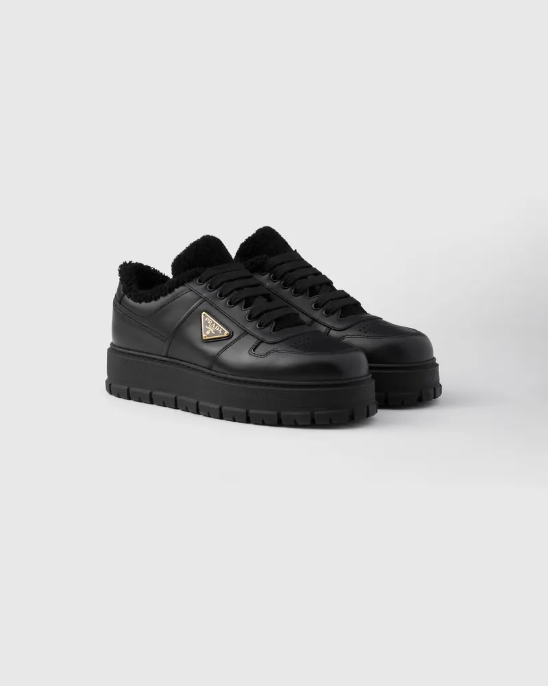 Prada Geschnürte Sneaker aus Leder Schwarz