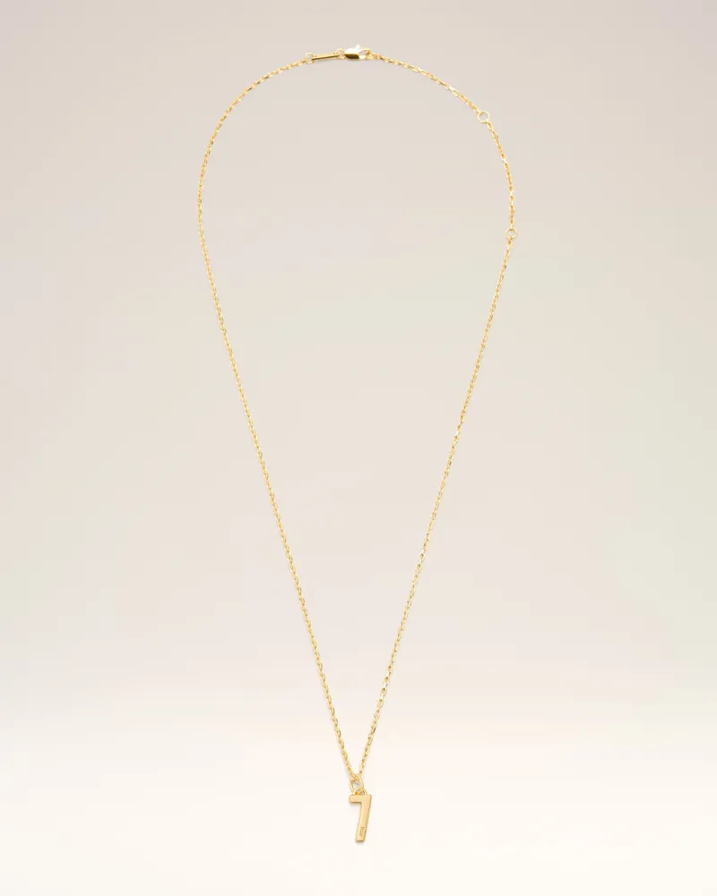 AMI Paris Halskette mit Anhänger aus goldfarbenem Messing mit gehämmerter „7“ Gelb Unisex Gold