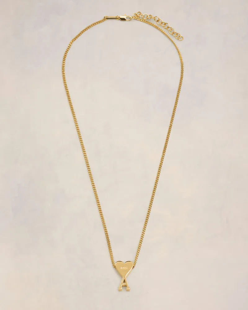 AMI Paris Ami De Coeur Halskette mit Anhänger aus Messing in Gold Gelb Unisex Gold