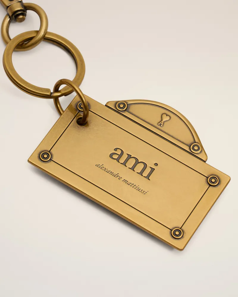 AMI Paris Street Schlüsselanhänger in Gold mit Plättchen Gelb Unisex Gebürstetes