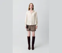 Fließende, plissierte Bluse