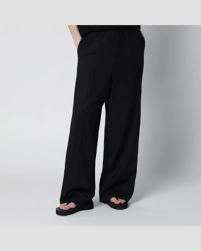 Balenciaga Palazzo-Hose mit elastischem Bund aus Wolle in Schwarz Black
