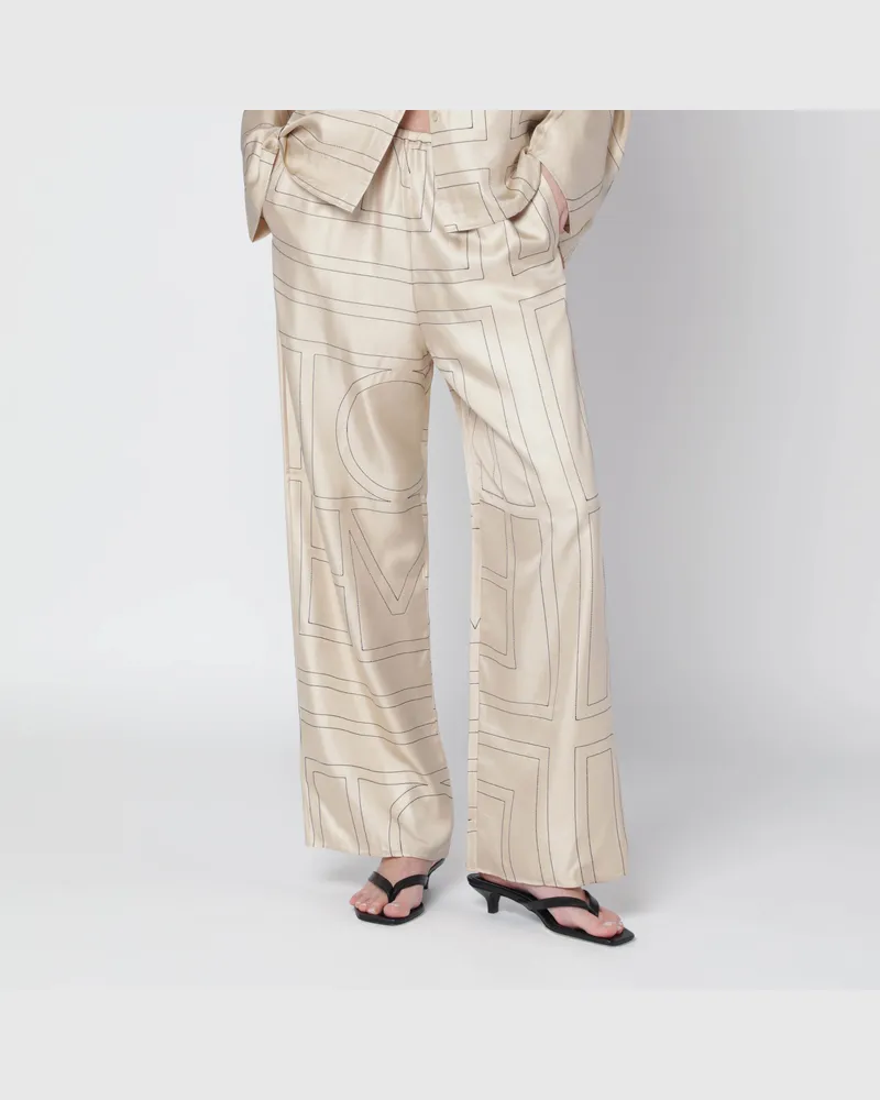 Totême Pyjama-Hose aus Seide mit Monogramm in Elfenbein White