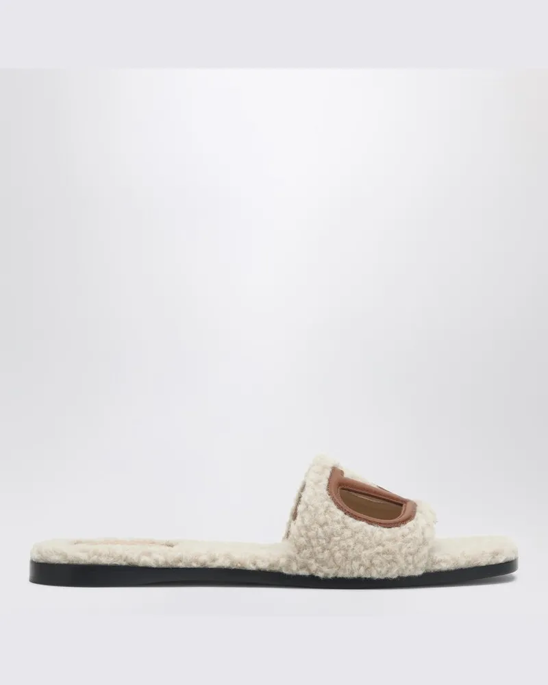 Valentino Garavani Slide-Sandale Vlogo Cut-out aus Shearling Beige