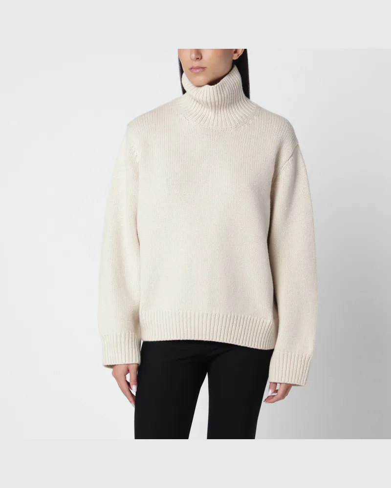 Totême Übergroßer, mandelfarbener Wollrollkragenpullover Beige