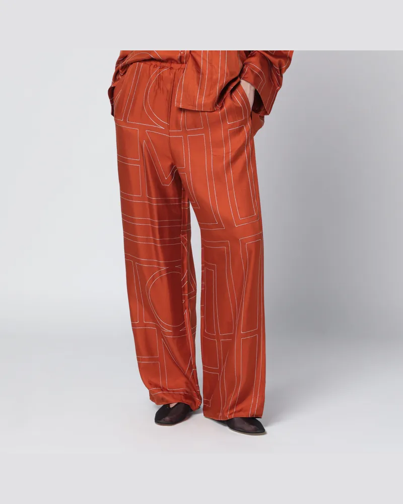 Totême Monogram Pyjamahose aus Seide in Terrakotta Brown