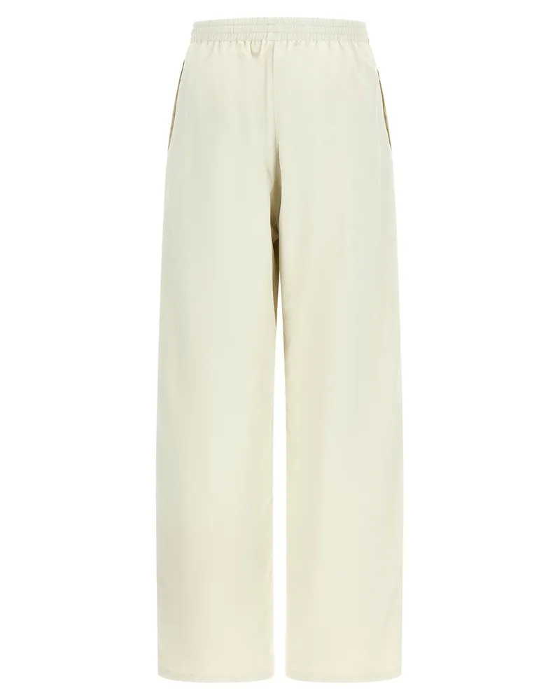 Balenciaga Cursive-Embroidered Reversible Joggers — Cream Cream