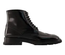 Brogue-Trimmed Leather Ankle Boot — Black