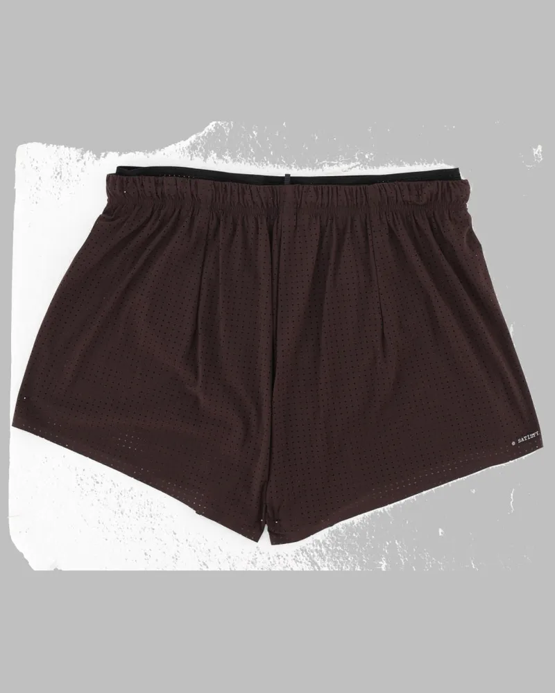 Satisfy Perforated Technical Fabric Shorts — Brown Brown