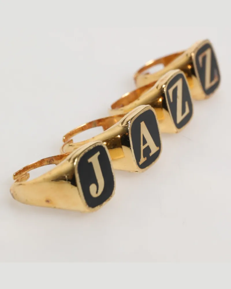 Dolce & Gabbana Men's Gold Tone Brass Jazz Letter Set 4 Pieces Adjustable Ring Black Silver Ename Gold