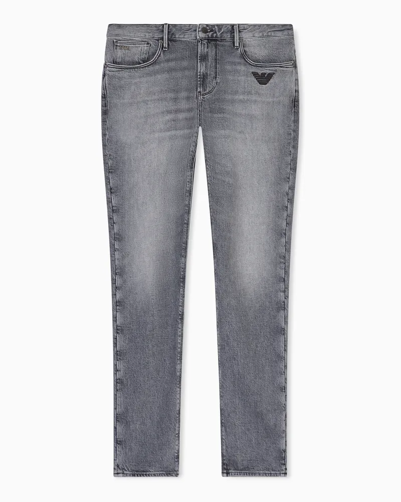 Emporio Armani J06 slim-fit jeans in washed denim with eagle embroidery Grau