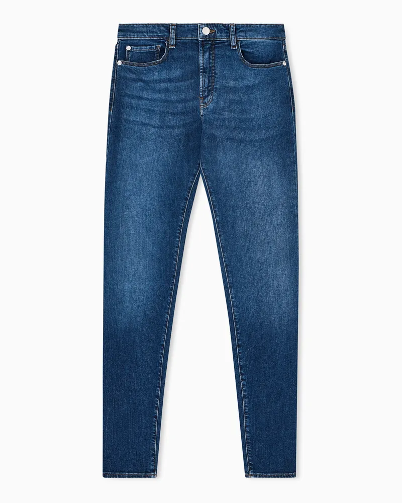 Emporio Armani J20 Jeans mit hoher Taille und sehr schmalem Bein, gefertigt aus Stretch-Denim im Used-Look Blau