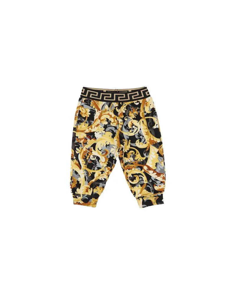 Versace HOSEN & RÖCKE - Hosenauf YOOX.COM Gelb