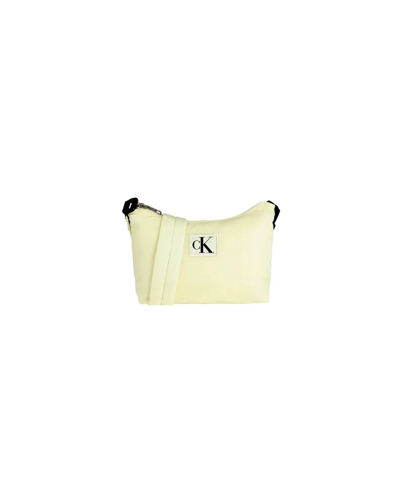 Calvin Klein TASCHEN - Umhängetascheauf YOOX.COM Pastellgelb