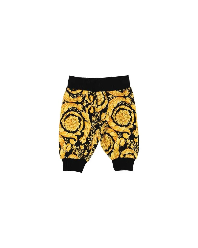 Versace HOSEN & RÖCKE - Hosenauf YOOX.COM Schwarz