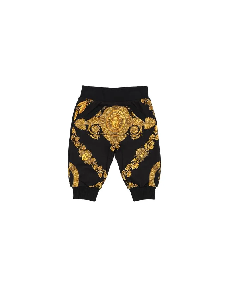 Versace HOSEN & RÖCKE - Hosenauf YOOX.COM Schwarz