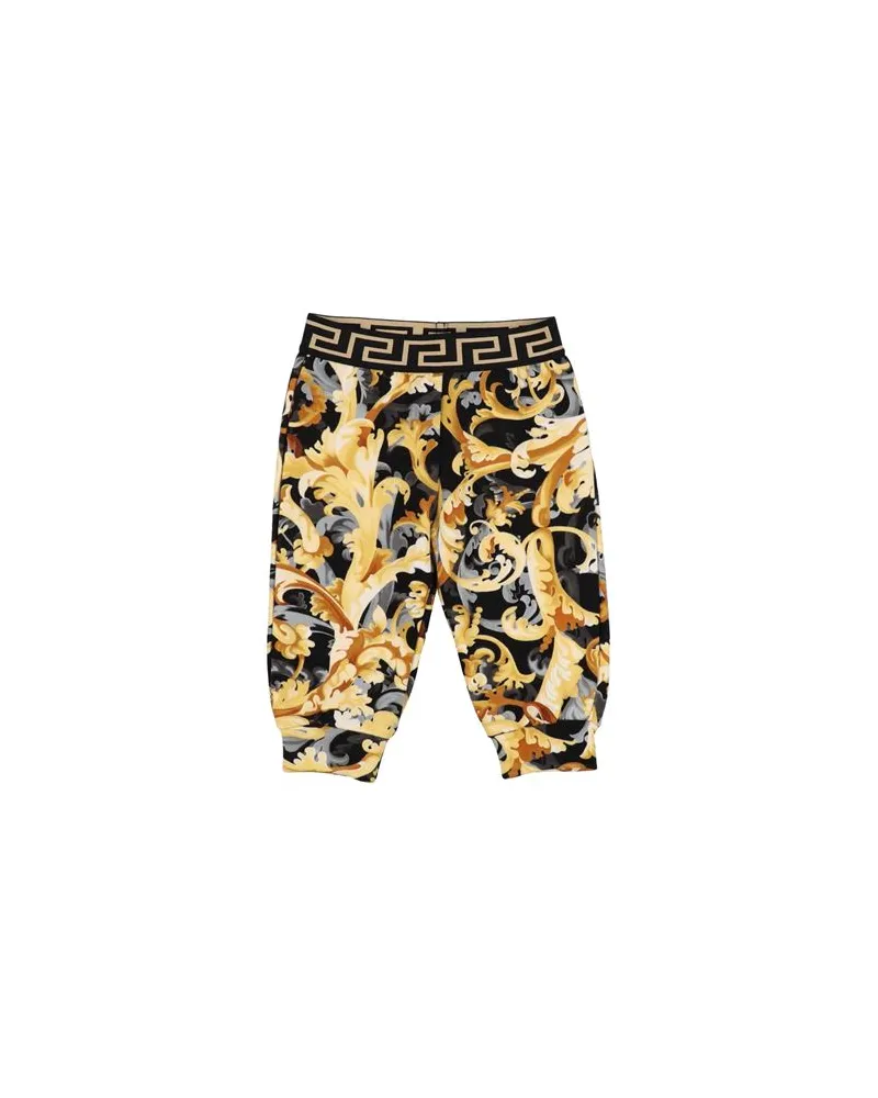 Versace HOSEN & RÖCKE - Hosenauf YOOX.COM Schwarz