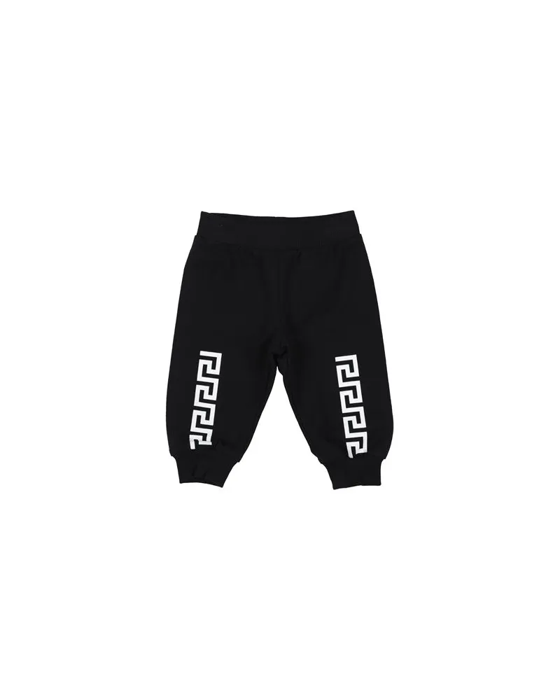 Versace HOSEN & RÖCKE - Hosenauf YOOX.COM Schwarz