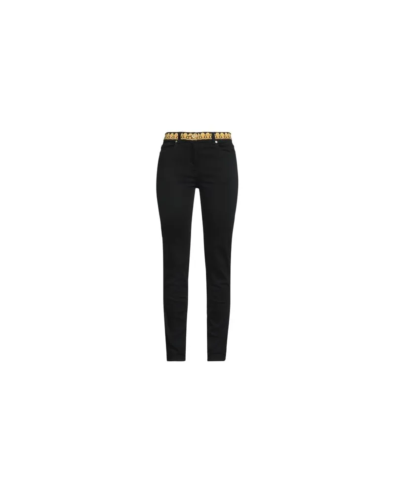 Versace HOSEN & RÖCKE - Jeanshosenauf YOOX.COM Schwarz