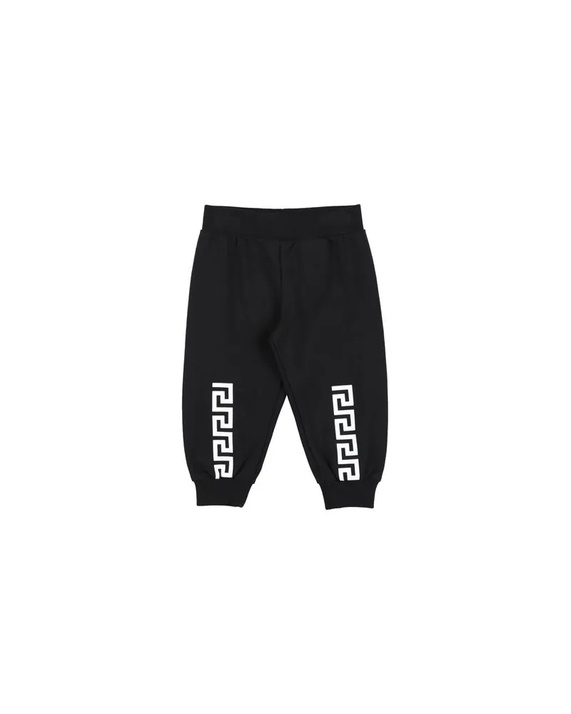 Versace HOSEN & RÖCKE - Hosenauf YOOX.COM Schwarz