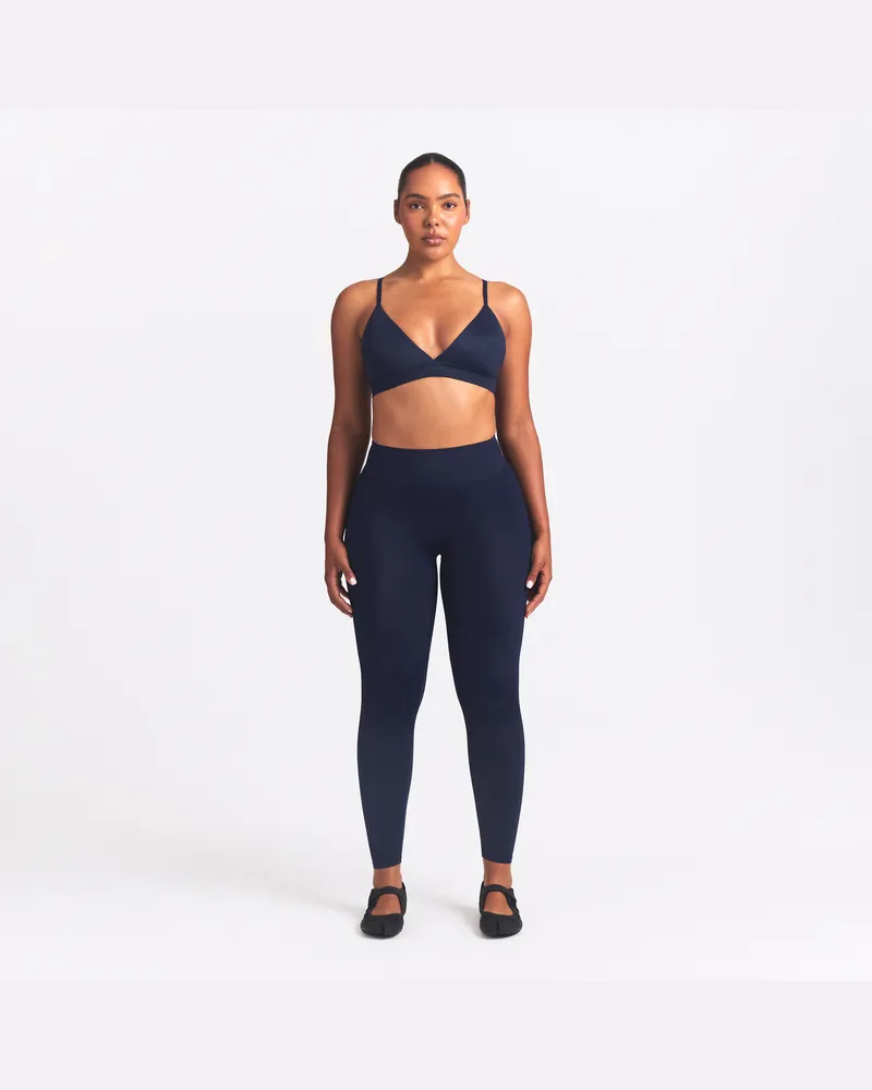 Nike SKIMS Shine Leggings mit hohem Bund und 66 cm für Damen - Blau Blau