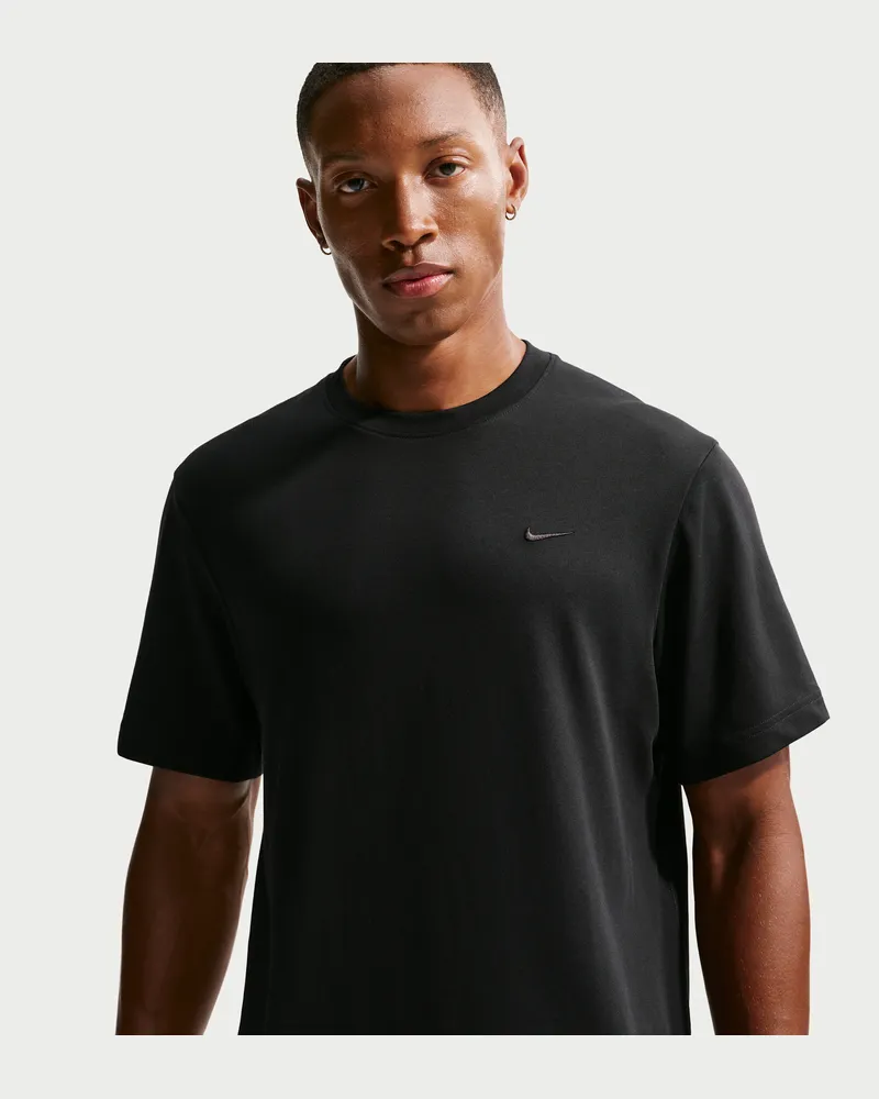 Nike Primary vielseitiges Nike Dri-FIT Kurzarm-Oberteil für Herren - Schwarz Schwarz