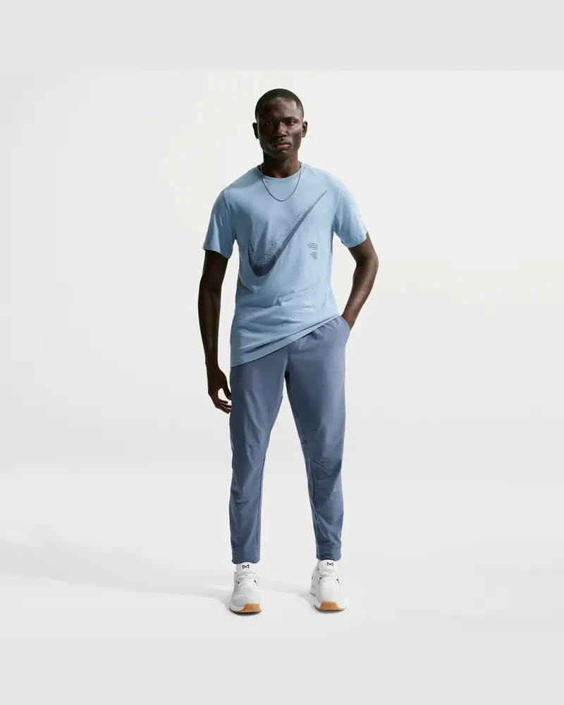 Nike Unlimited vielseitige Dri-FIT Hose mit Reißverschluss am Bündchen für Herren - Blau Blau