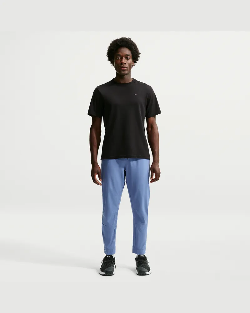 Nike Unlimited vielseitige Dri-FIT Hose mit Reißverschluss am Bündchen für Herren - Blau Blau