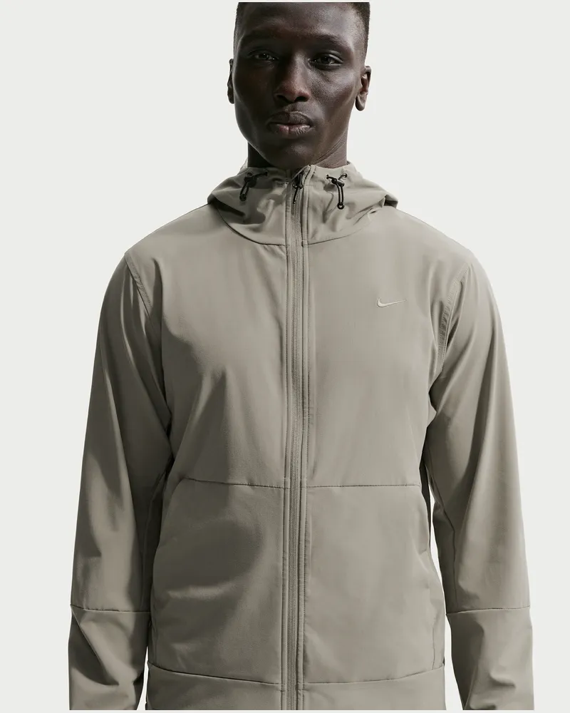 Nike Unlimited vielseitige Repel-Jacke mit Kapuze für Herren - Grün Grün