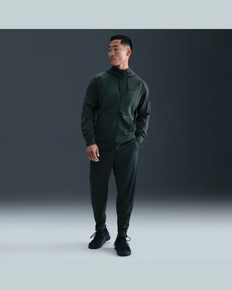 Nike Totality vielseitige Hose mit schmal zulaufender Passform und für Herren - Grün Grün
