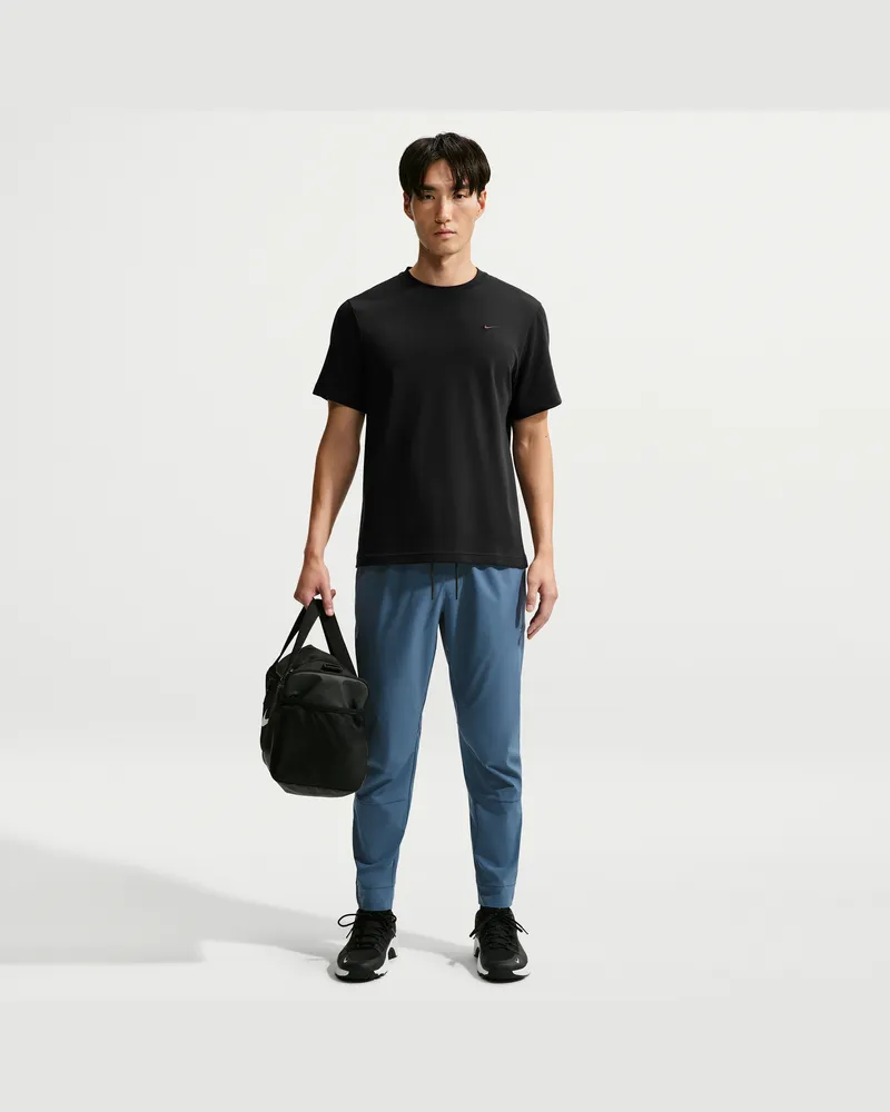Nike Unlimited vielseitige Dri-FIT Hose mit Reißverschluss am Bündchen für Herren - Blau Blau