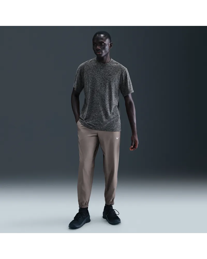 Nike Form vielseitige Hose mit schmal zulaufender Passform und für Herren - Grau Grau