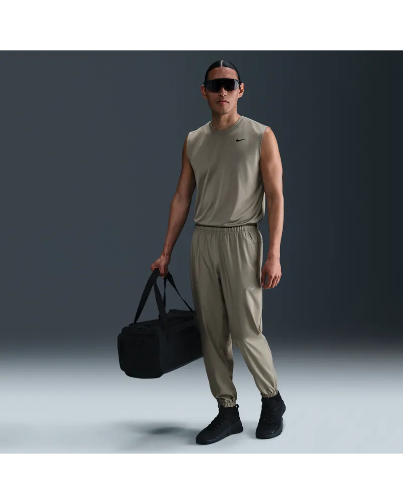 Nike Form vielseitige Hose mit schmal zulaufender Passform und für Herren - Grün Grün