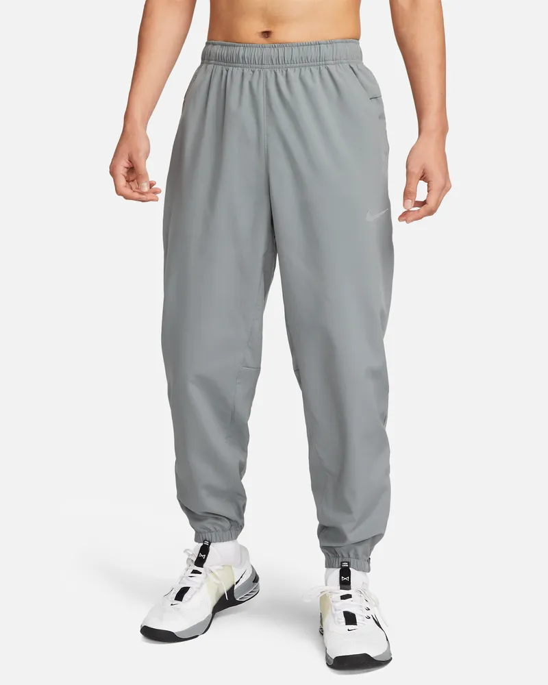 Nike Form vielseitige Hose mit schmal zulaufender Passform und für Herren - Grau Grau