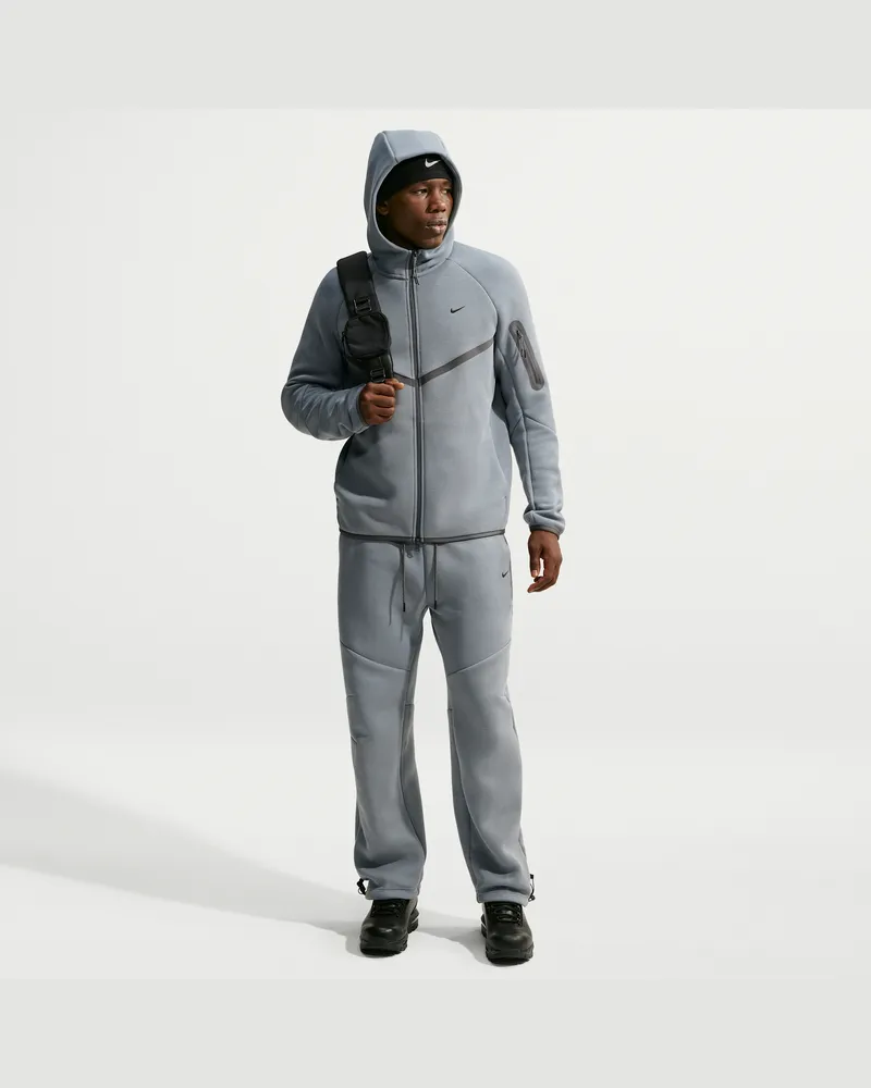 Nike Tech Fleece-Hose mit offenem Saum und reflektierenden Designakzenten (Herren) - Grau Grau
