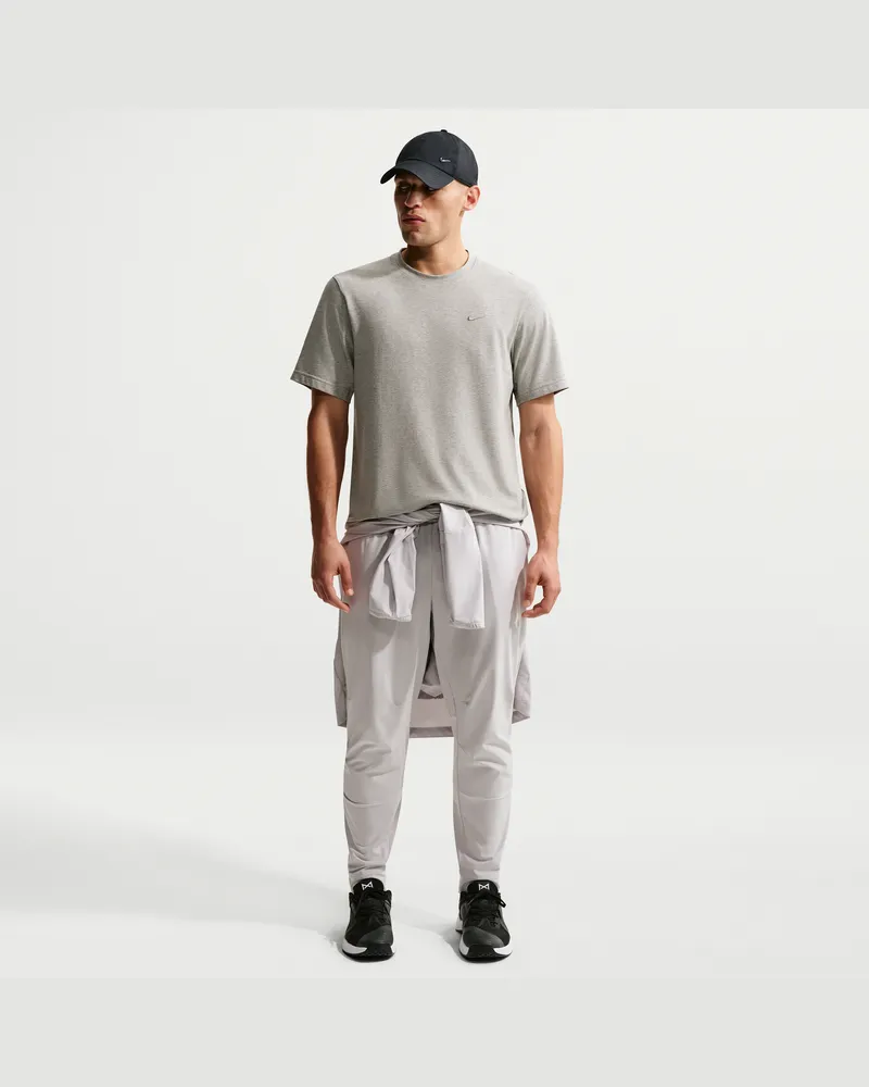 Nike Unlimited vielseitige Dri-FIT Hose mit Reißverschluss am Bündchen für Herren - Grau Grau