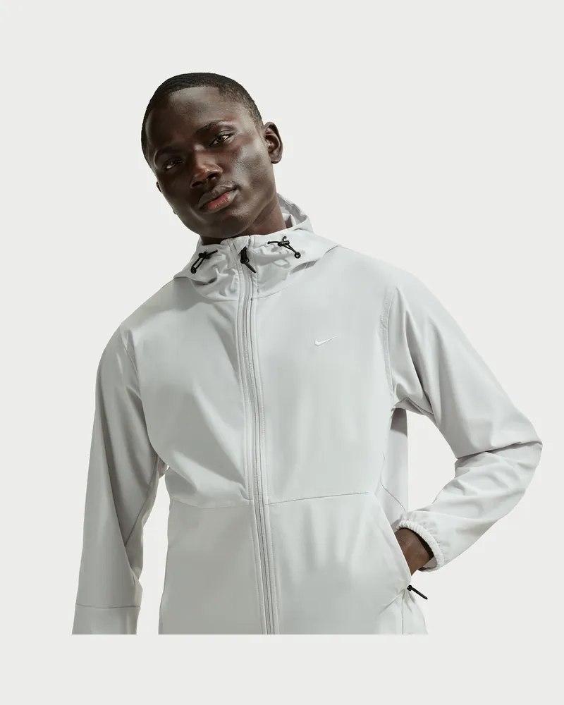 Nike Unlimited vielseitige Repel-Jacke mit Kapuze für Herren - Grau Grau