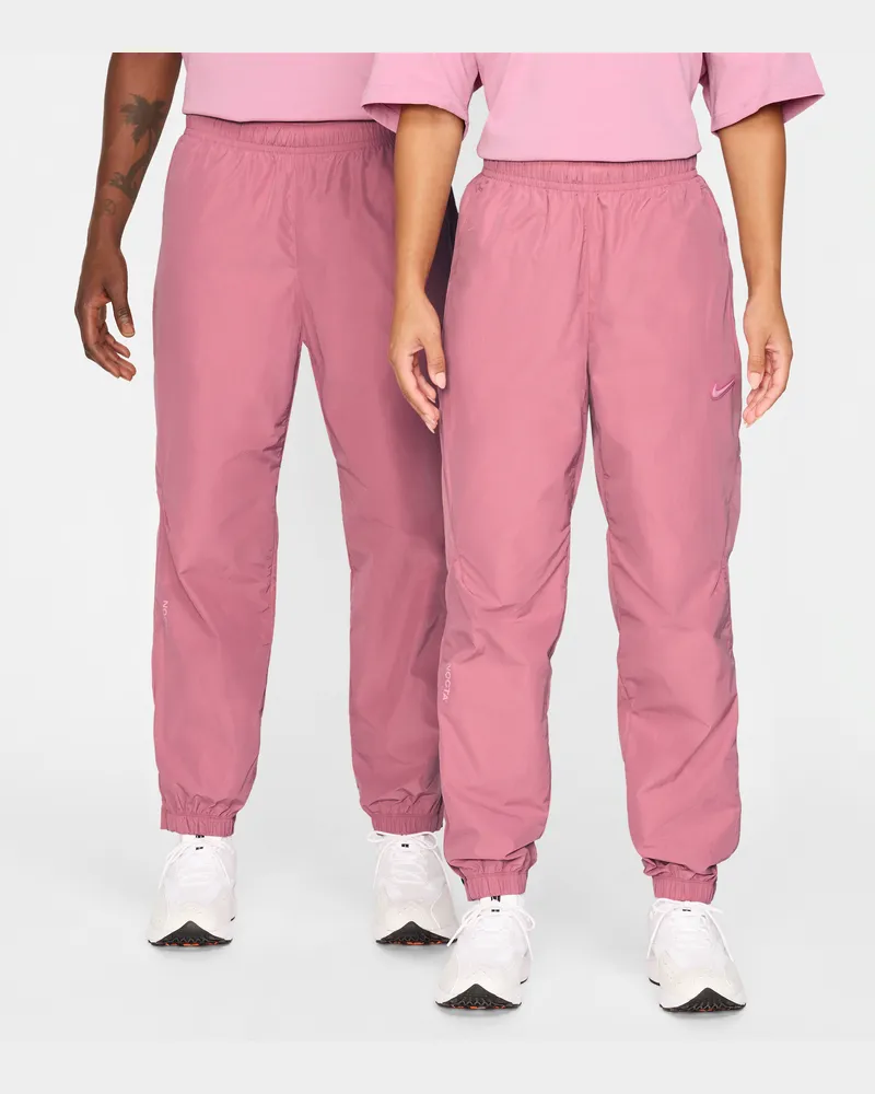 Nike NOCTA Northstar Trainingshose aus Nylon - Pink Pink
