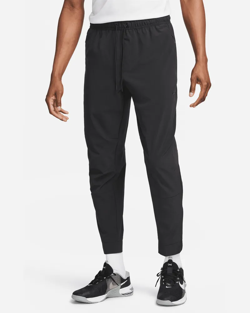 Nike Unlimited vielseitige Dri-FIT Hose mit Reißverschluss am Bündchen für Herren - Schwarz Schwarz