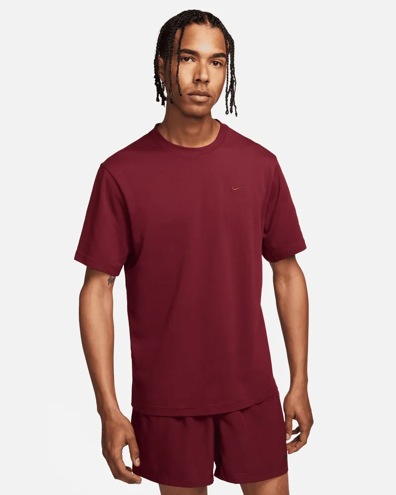 Nike Primary vielseitiges Nike Dri-FIT Kurzarm-Oberteil für Herren - Rot Rot