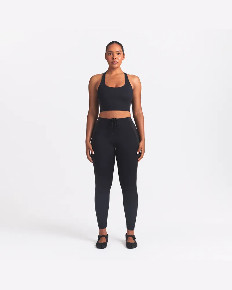 Nike SKIMS Matte Shine Mix Damen-Leggings (ca. 66 cm) - Schwarz Schwarz